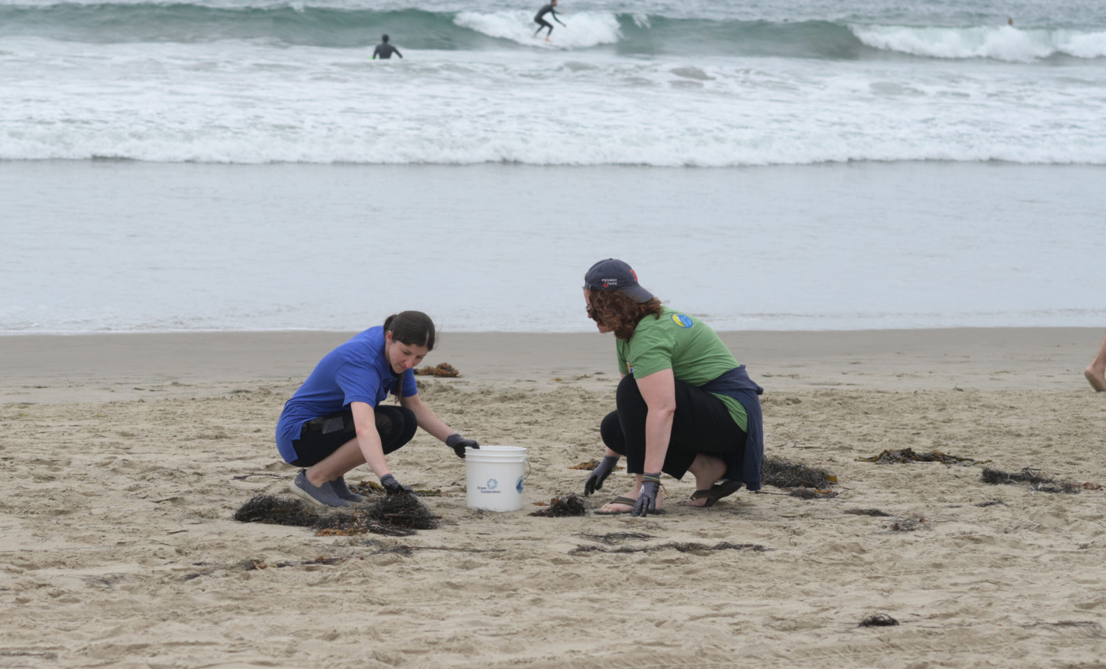 Volunteers participate in 2022 International Coastal Cleanup event in Santa Monica, California.